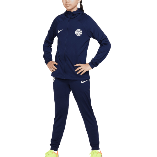 Front of zip tote bag with white canvas, black canvas straps and handle, and black zipper pulls.