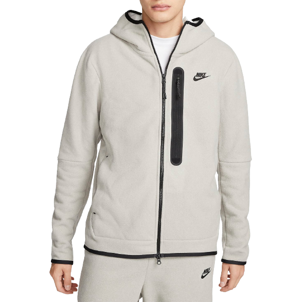 Front of zip tote bag with white canvas, black canvas straps and handle, and black zipper pulls.