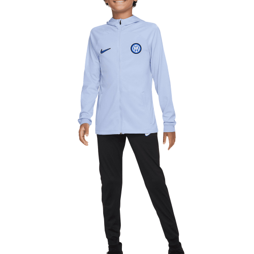 Front of zip tote bag with white canvas, black canvas straps and handle, and black zipper pulls.