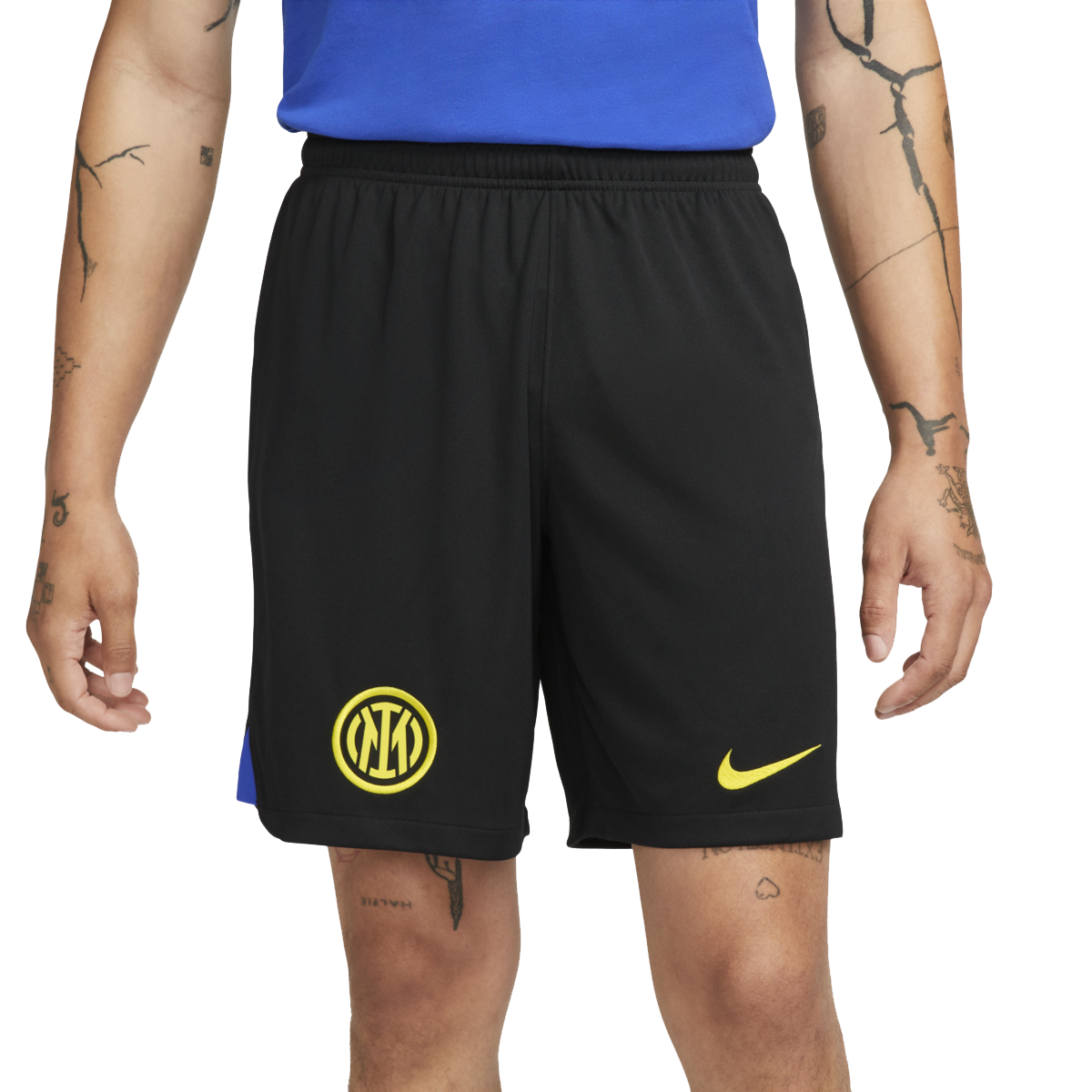 Front of zip tote bag with white canvas, black canvas straps and handle, and black zipper pulls.