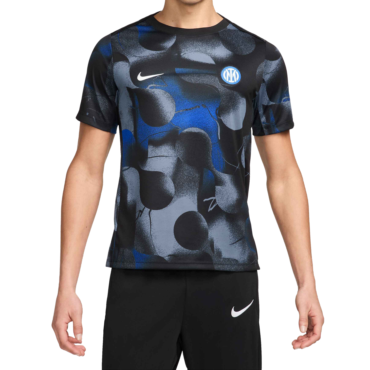 Front of zip tote bag with white canvas, black canvas straps and handle, and black zipper pulls.