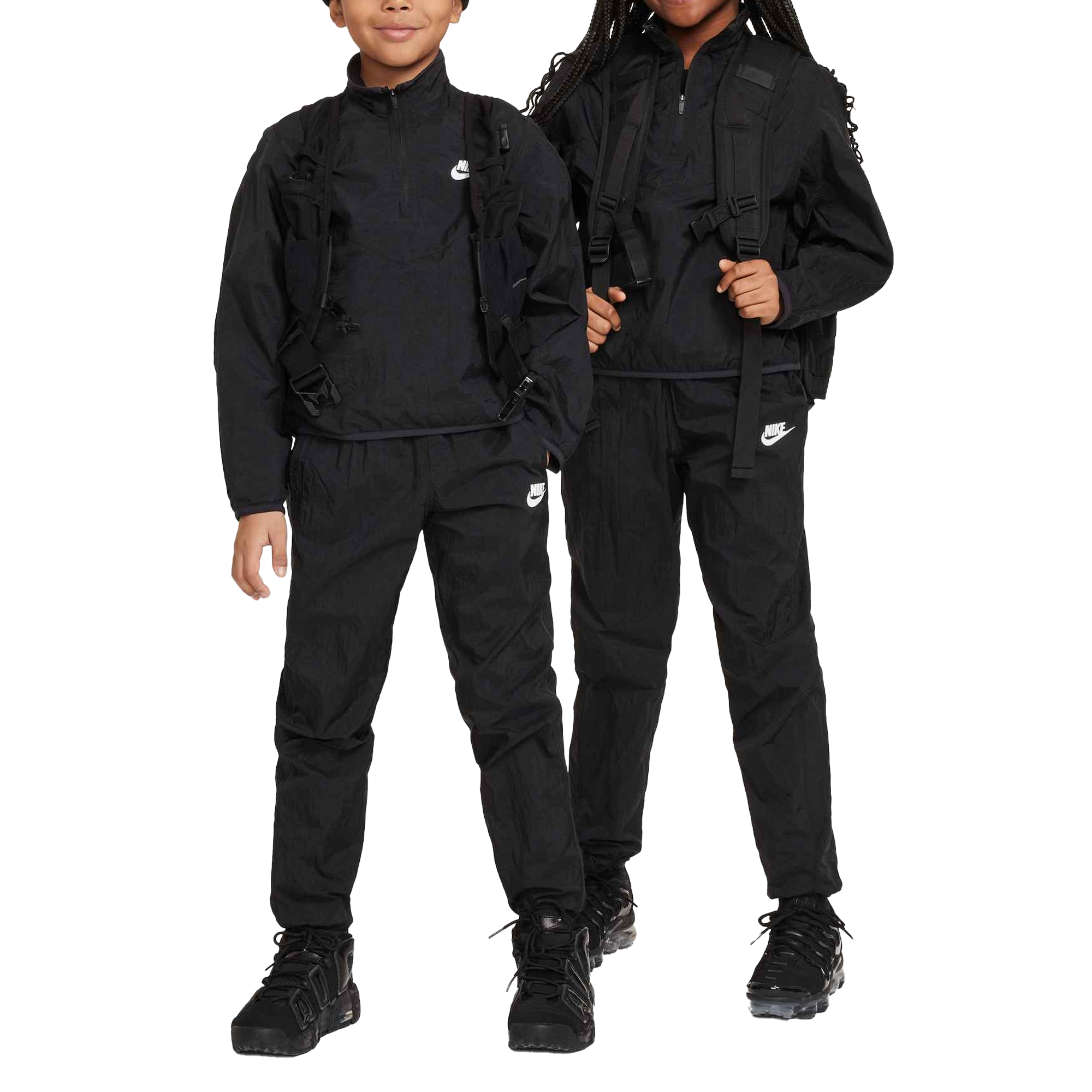 Front of zip tote bag with white canvas, black canvas straps and handle, and black zipper pulls.