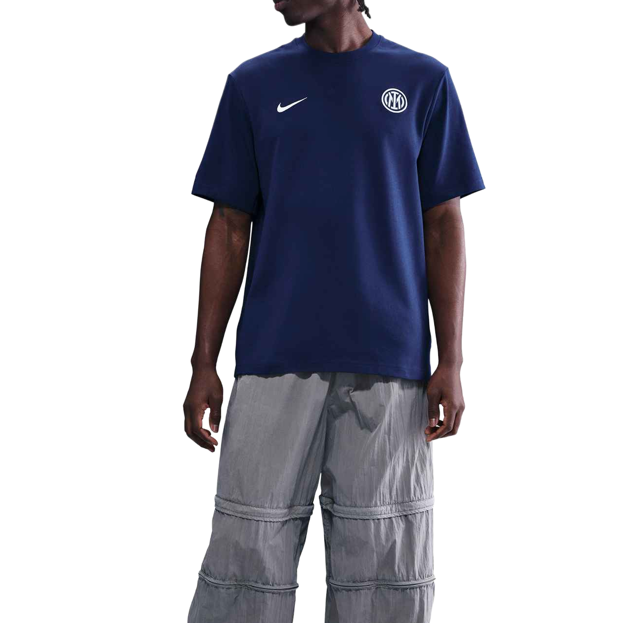 Front of zip tote bag with white canvas, black canvas straps and handle, and black zipper pulls.