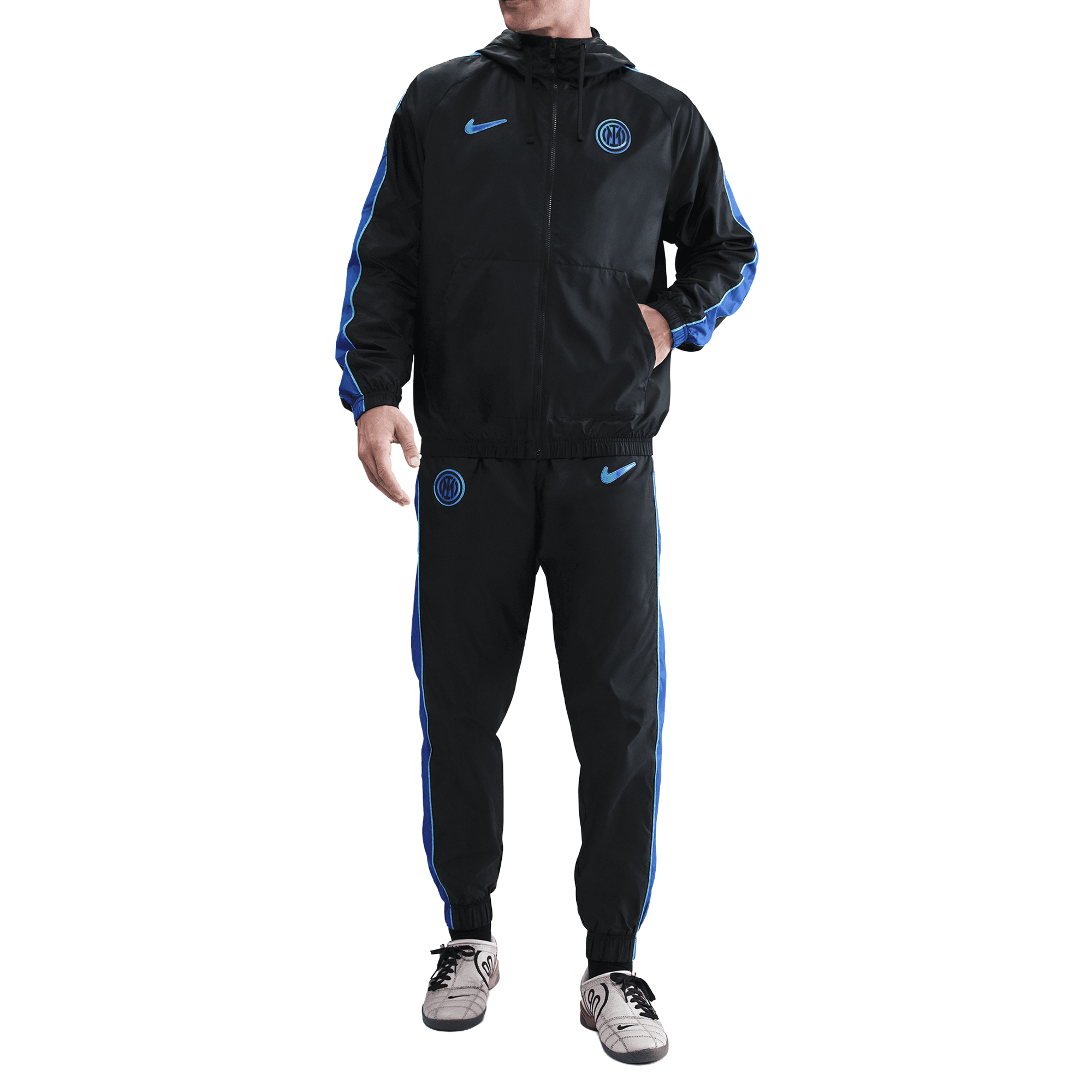 Front of zip tote bag with white canvas, black canvas straps and handle, and black zipper pulls.