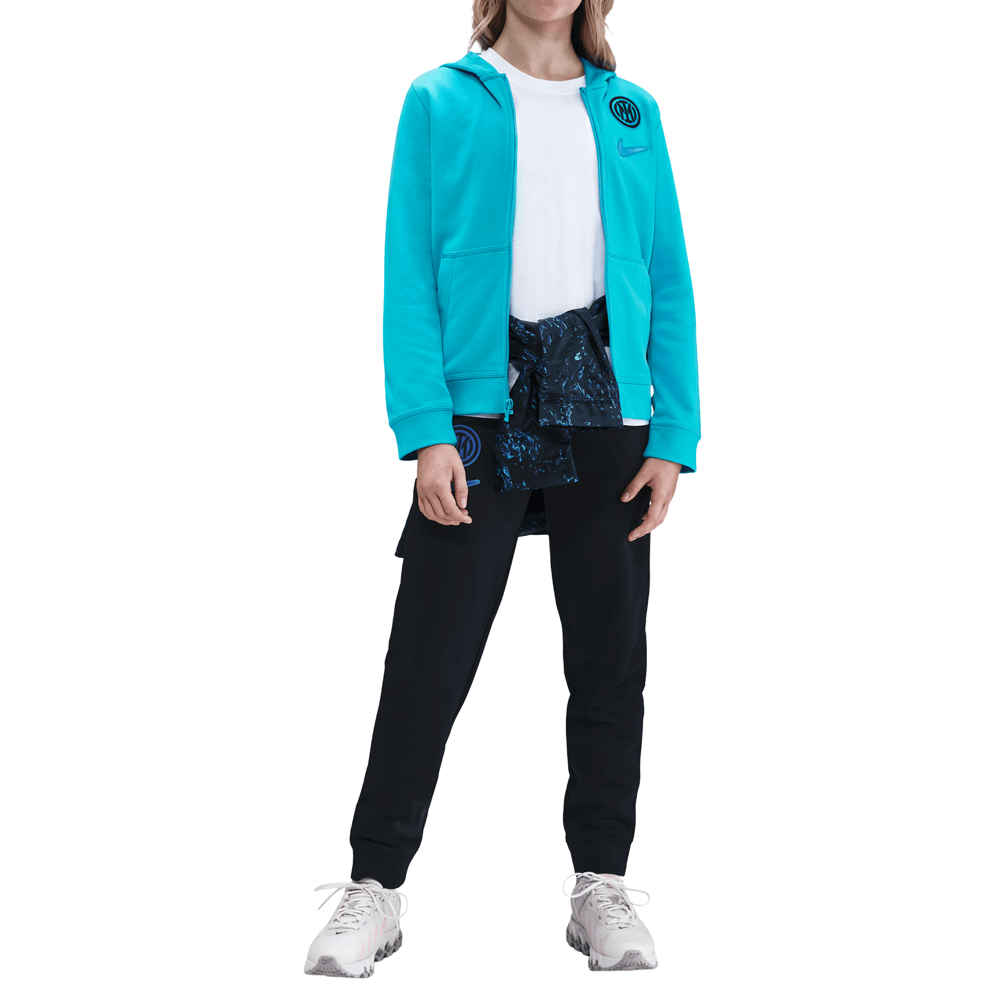 Front of zip tote bag with white canvas, black canvas straps and handle, and black zipper pulls.