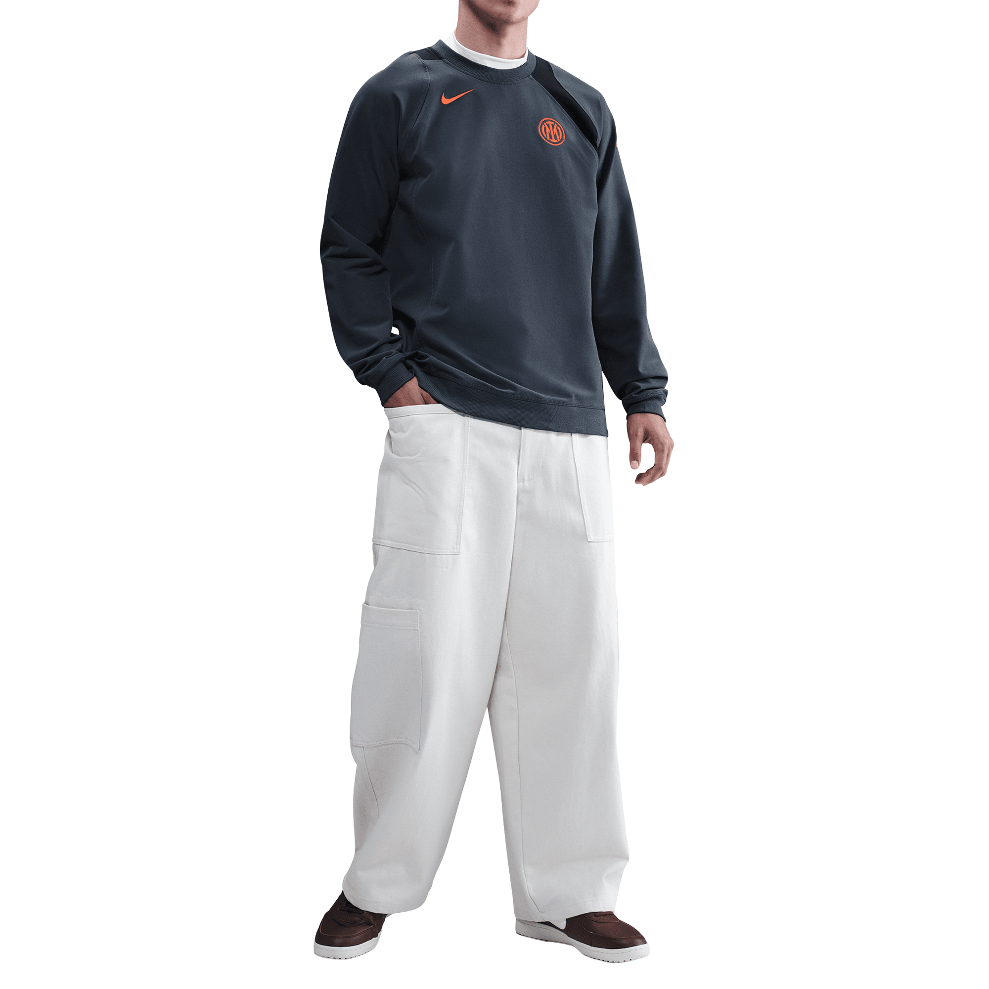 Front of zip tote bag with white canvas, black canvas straps and handle, and black zipper pulls.