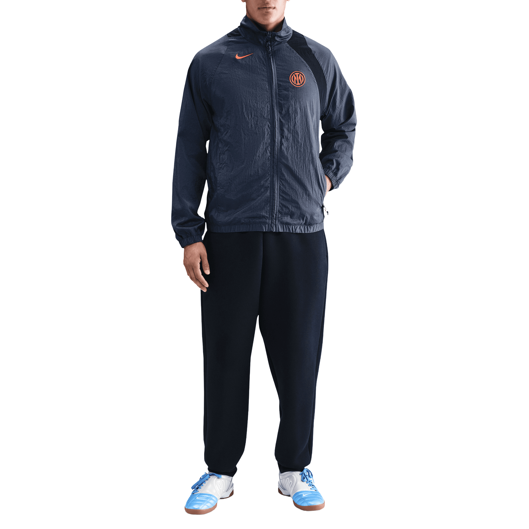 Front of zip tote bag with white canvas, black canvas straps and handle, and black zipper pulls.