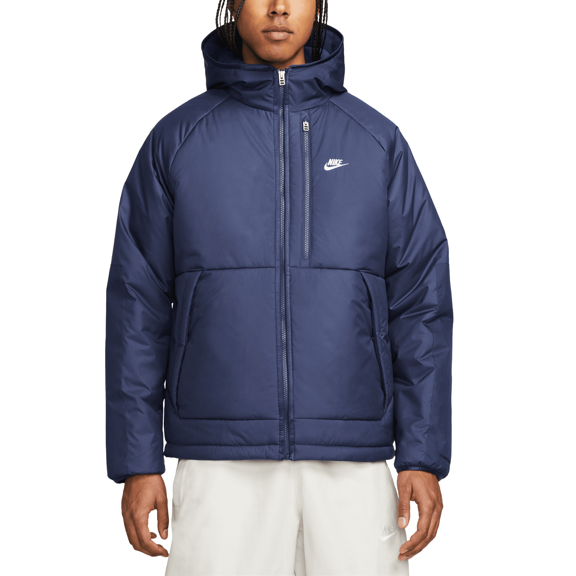 Front of zip tote bag with white canvas, black canvas straps and handle, and black zipper pulls.