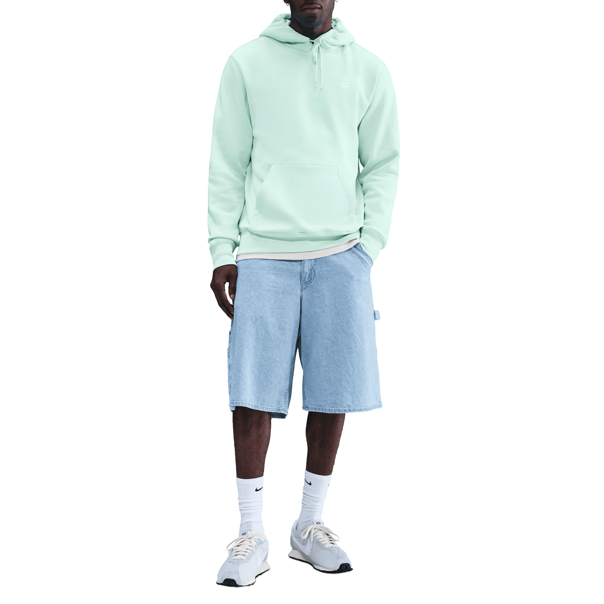 Front of zip tote bag with white canvas, black canvas straps and handle, and black zipper pulls.