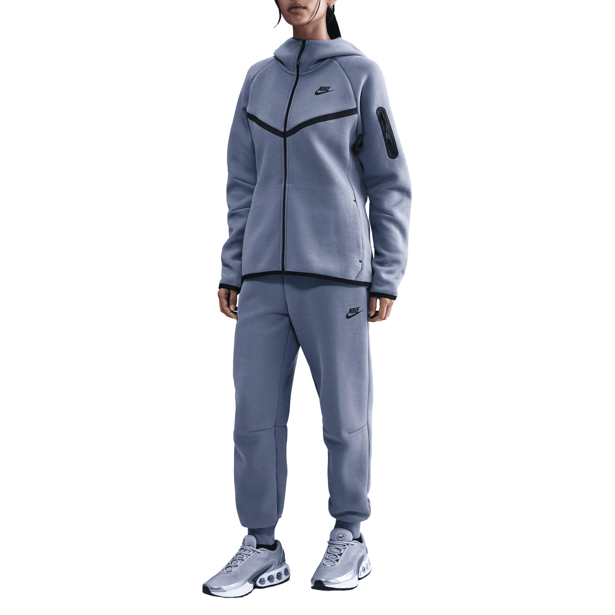 Front of zip tote bag with white canvas, black canvas straps and handle, and black zipper pulls.