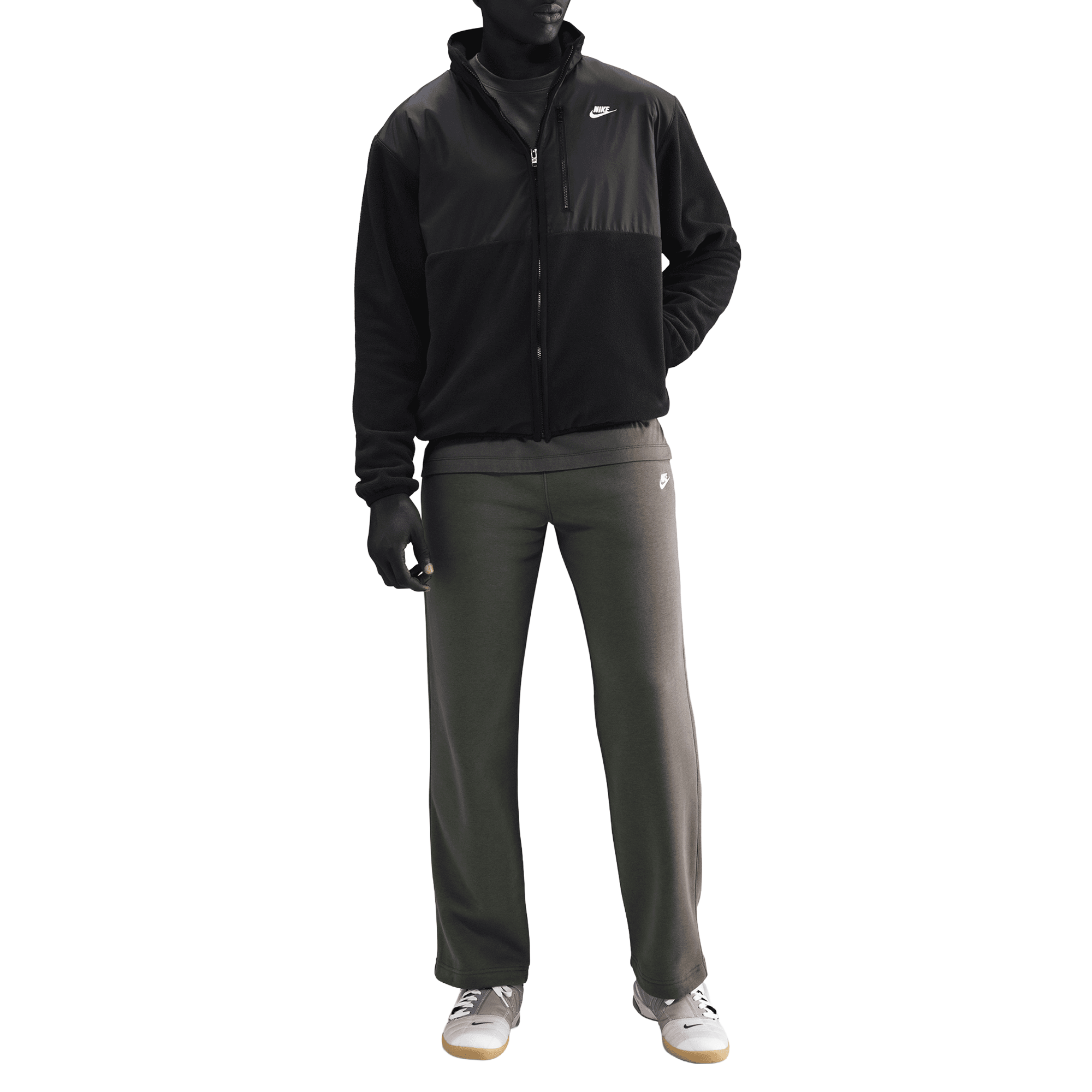 Front of zip tote bag with white canvas, black canvas straps and handle, and black zipper pulls.